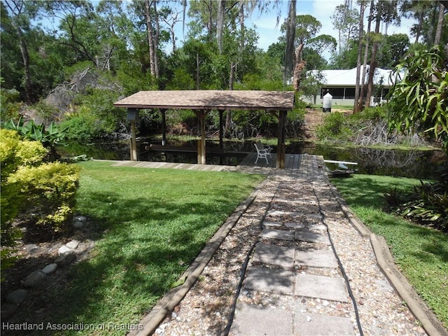 1605 Lake Clay Dr, Lake Placid, FL 33852 - surrounding community with a yard