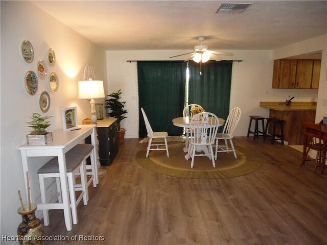 1605 Lake Clay Dr, Lake Placid, FL 33852 - dining space featuring wood finished floors and a ceiling fan