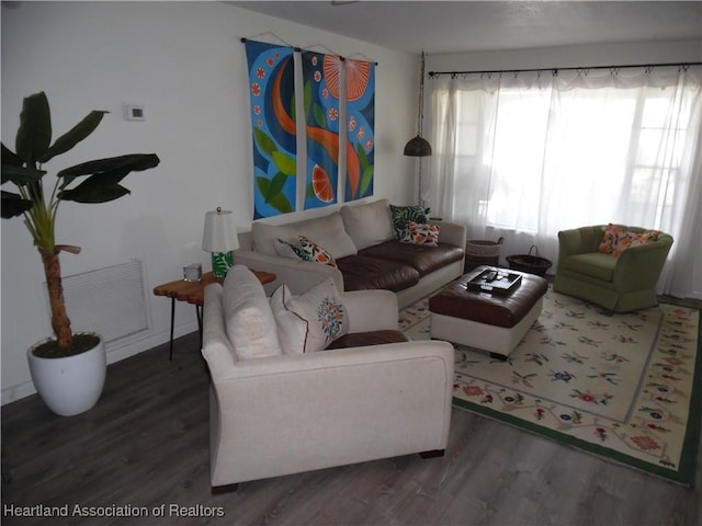 1605 Lake Clay Dr, Lake Placid, FL 33852 - living room featuring wood finished floors