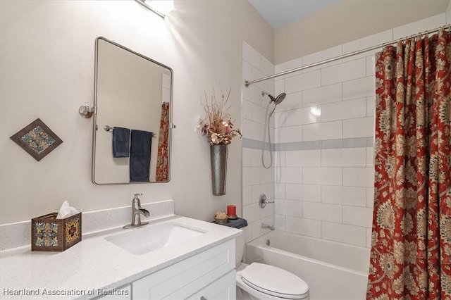 full bathroom featuring shower / bath combination with curtain, vanity, and toilet