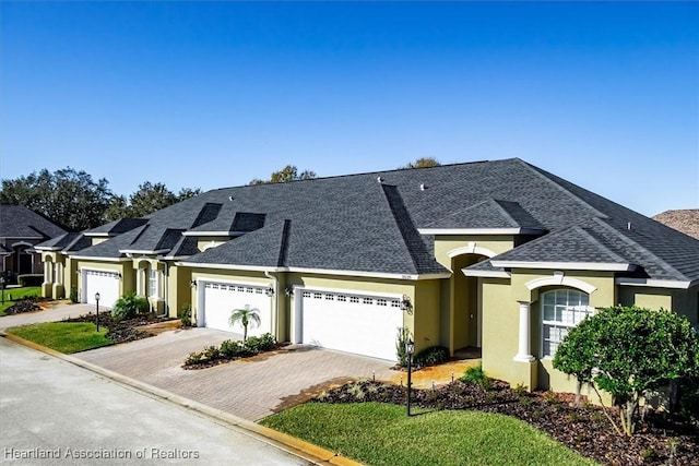 view of front of house with a garage