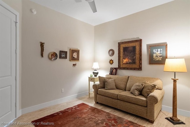 living room featuring ceiling fan