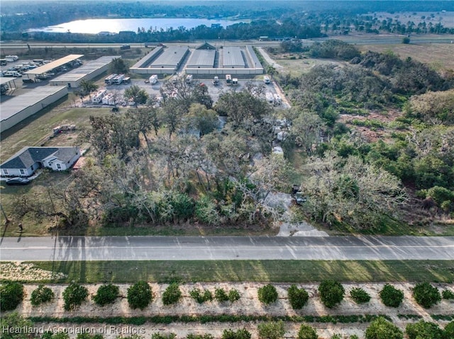 birds eye view of property with a rural view