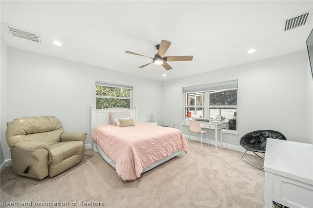 carpeted bedroom featuring ceiling fan