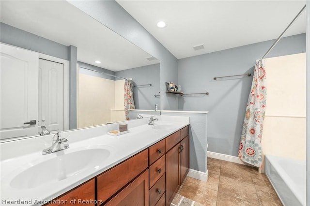 full bathroom featuring tile patterned flooring, vanity, shower / bath combination with curtain, and toilet