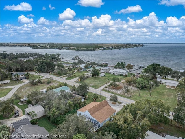 bird's eye view with a water view