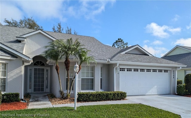 ranch-style home featuring a garage