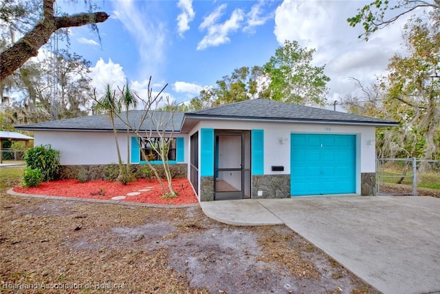 view of front of home with a garage