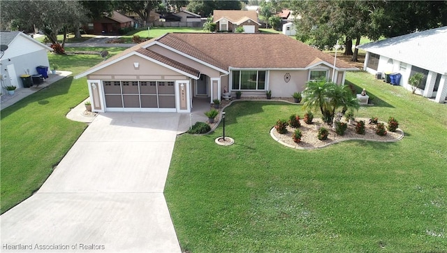 single story home featuring a garage and a front lawn