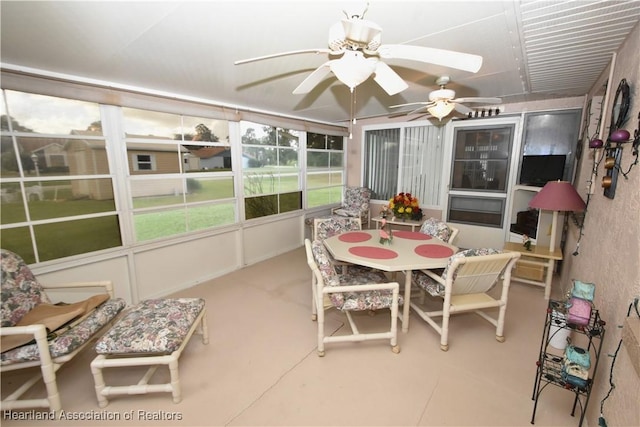 sunroom / solarium with ceiling fan