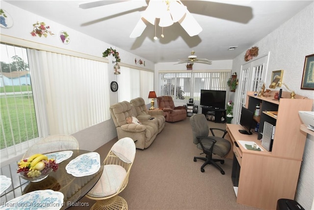 office space featuring french doors, carpet flooring, and ceiling fan