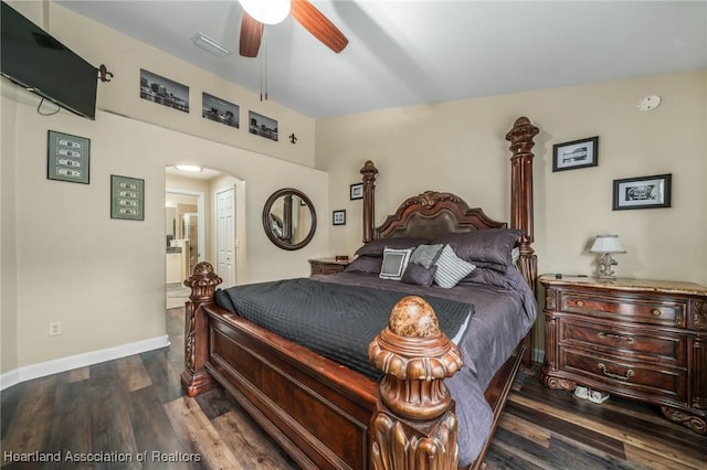 bedroom featuring ceiling fan, dark wood-type flooring, and a closet