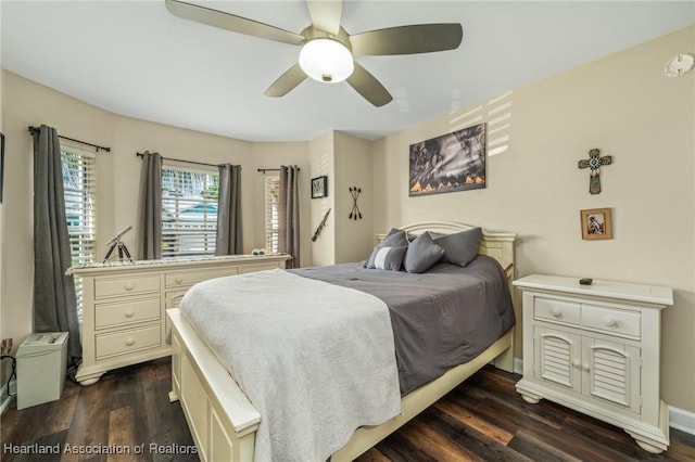 bedroom featuring dark hardwood / wood-style floors and ceiling fan