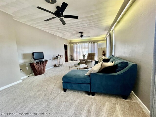 living room featuring ceiling fan and carpet floors