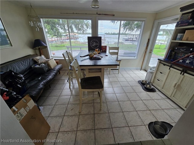 2068 Oak Blvd, Sebring, FL 33875 - dining space with ornamental molding and light tile patterned floors