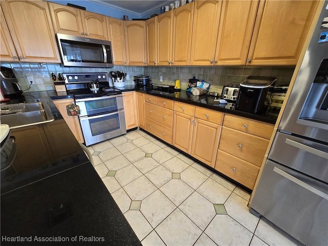 2068 Oak Blvd, Sebring, FL 33875 - kitchen featuring appliances with stainless steel finishes, light tile patterned flooring, backsplash, crown molding, and dark countertops