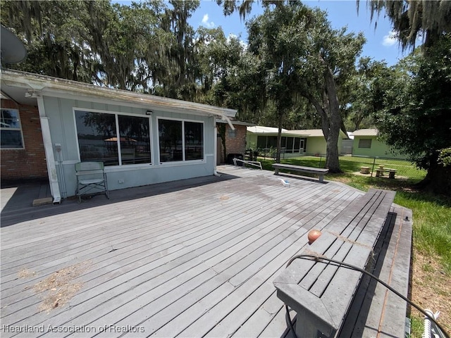 2068 Oak Blvd, Sebring, FL 33875 - wooden terrace featuring a lawn
