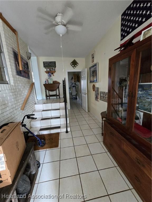 2068 Oak Blvd, Sebring, FL 33875 - corridor with light tile patterned floors