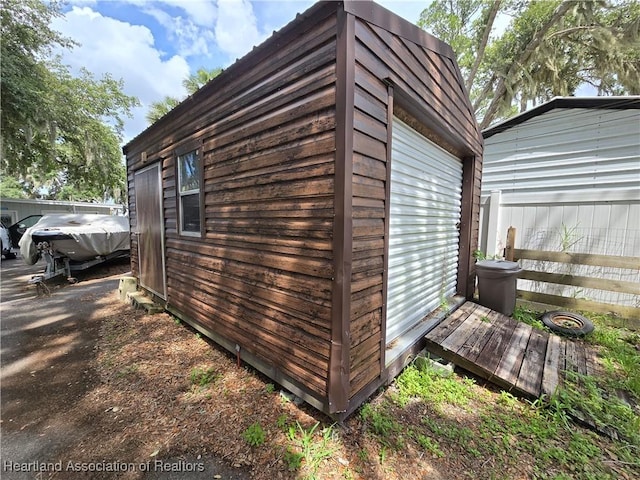 2068 Oak Blvd, Sebring, FL 33875 - view of side of property featuring an outdoor structure