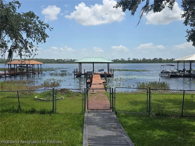 2068 Oak Blvd, Sebring, FL 33875 - dock area featuring a gate, a water view, and boat lift