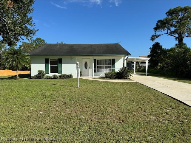 ranch-style home featuring a front lawn, a carport, and covered porch