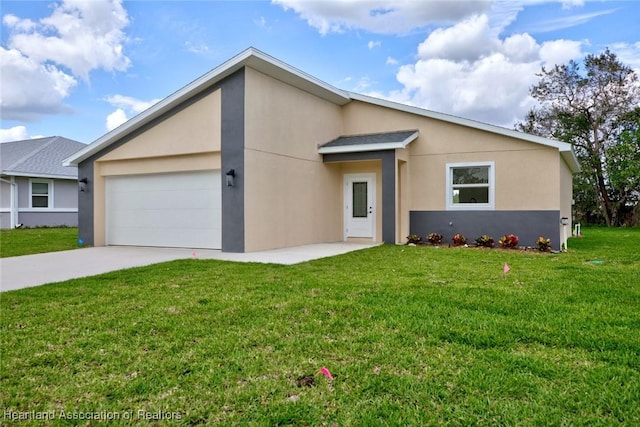 view of front of house with concrete driveway, a front yard, an attached garage, and stucco siding