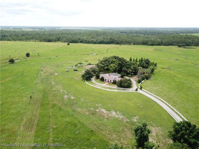 aerial view of sparsely populated area with agricultural land