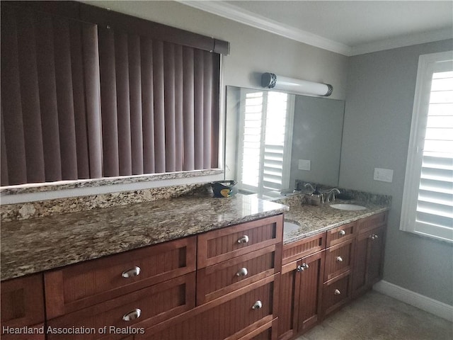 full bath featuring double vanity and ornamental molding