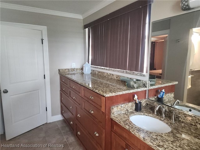 full bath with crown molding, vanity, and tile patterned floors