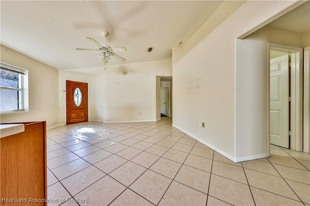 entrance foyer featuring ceiling fan and light tile patterned flooring