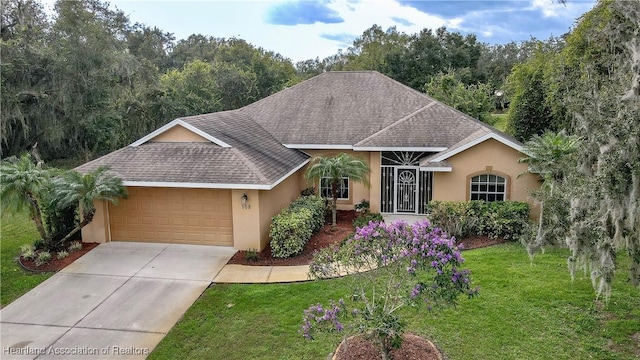 ranch-style home featuring a garage and a front yard