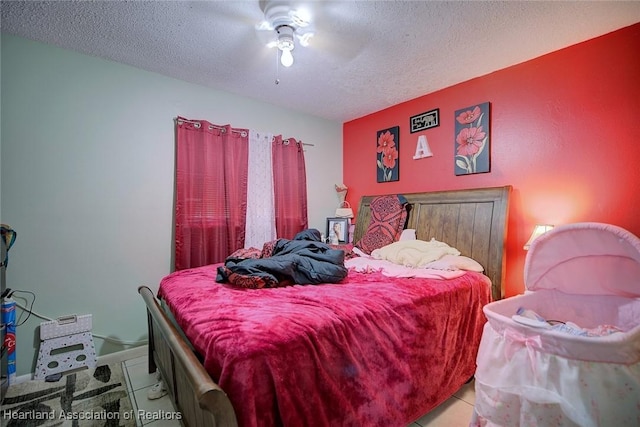 612 Denise Ave, Sebring, FL 33870 - tiled bedroom featuring ceiling fan and a textured ceiling
