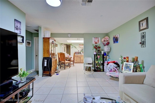 612 Denise Ave, Sebring, FL 33870 - living area featuring light tile patterned floors and visible vents