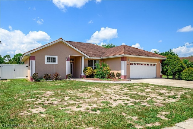 ranch-style house with a front yard and a garage