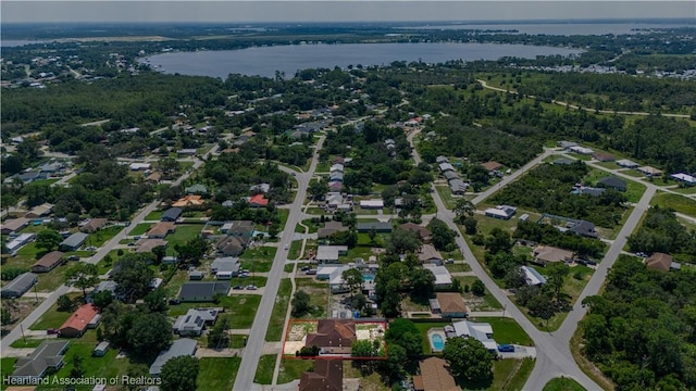 drone / aerial view with a water view