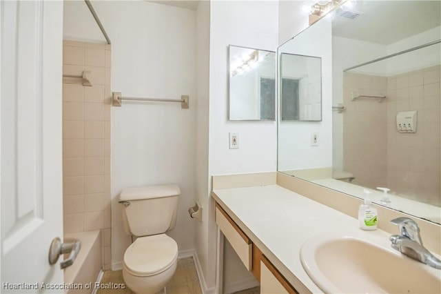 full bathroom with vanity, tiled shower / bath combo, and toilet