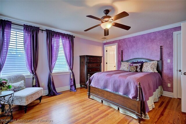 1831 Lakeview Dr, Sebring, FL 33870 - bedroom featuring light wood-style floors, baseboards, crown molding, and ceiling fan