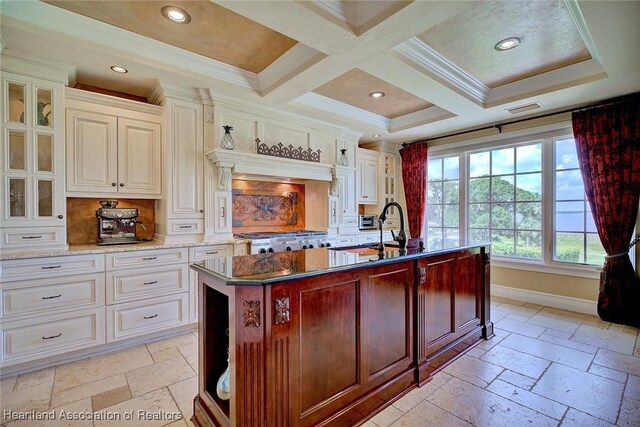 1831 Lakeview Dr, Sebring, FL 33870 - kitchen with stone tile flooring, recessed lighting, decorative backsplash, glass insert cabinets, and ornamental molding
