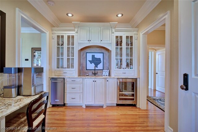 1831 Lakeview Dr, Sebring, FL 33870 - bar area with beverage cooler, light wood-style flooring, ornamental molding, a sink, and recessed lighting
