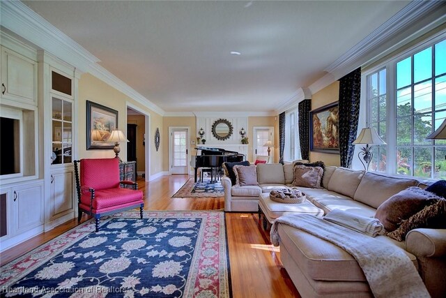 1831 Lakeview Dr, Sebring, FL 33870 - living area with ornamental molding, wood finished floors, and baseboards
