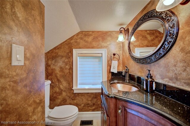 1831 Lakeview Dr, Sebring, FL 33870 - bathroom featuring toilet, vanity, and tile patterned floors
