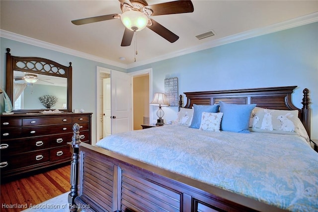 1831 Lakeview Dr, Sebring, FL 33870 - bedroom with wood finished floors, crown molding, and a ceiling fan
