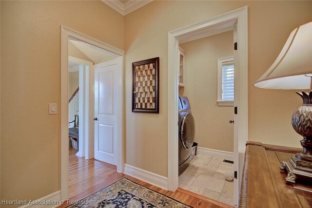 1831 Lakeview Dr, Sebring, FL 33870 - corridor featuring baseboards, crown molding, and washer / clothes dryer
