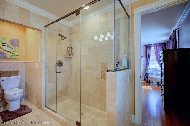 1831 Lakeview Dr, Sebring, FL 33870 - full bath with ornamental molding, toilet, a stall shower, and tile walls