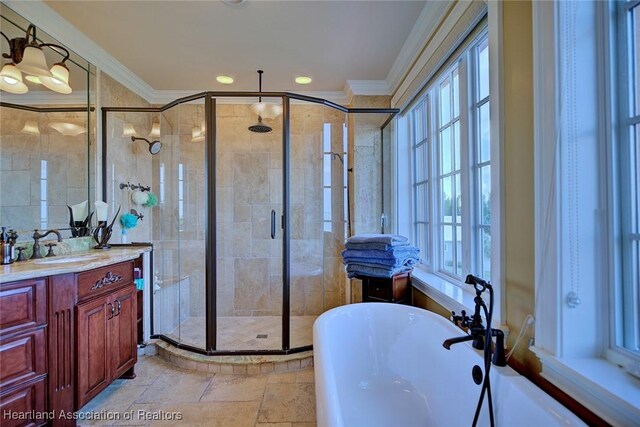 1831 Lakeview Dr, Sebring, FL 33870 - full bathroom featuring crown molding, vanity, a shower stall, a freestanding tub, and recessed lighting