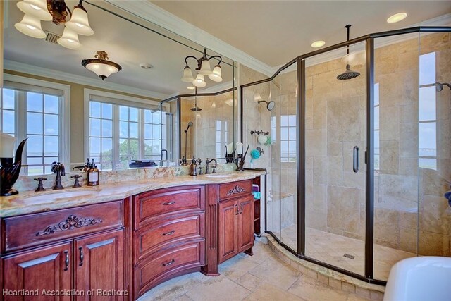 1831 Lakeview Dr, Sebring, FL 33870 - full bath featuring ornamental molding, a shower stall, double vanity, a bath, and recessed lighting