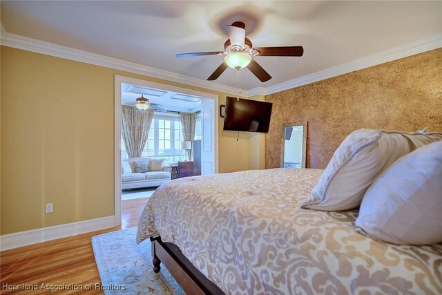 1831 Lakeview Dr, Sebring, FL 33870 - bedroom with ornamental molding, baseboards, wood finished floors, and ceiling fan