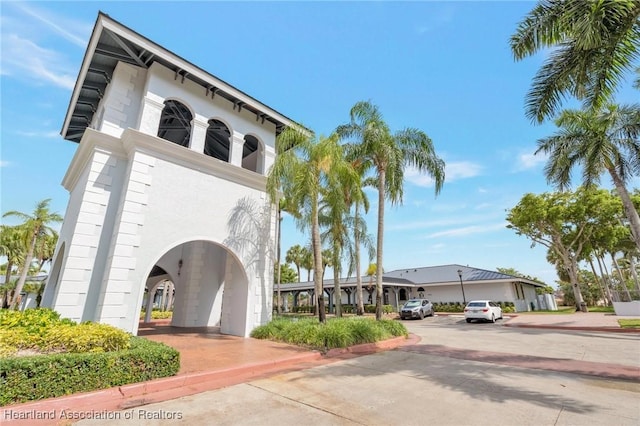 18210 Mediterranean Blvd Unit 5-20, Hialeah, FL 33015 - view of front facade featuring stucco siding