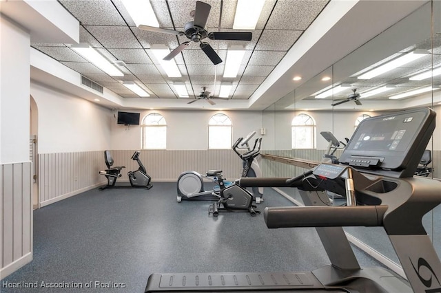18210 Mediterranean Blvd Unit 5-20, Hialeah, FL 33015 - exercise room featuring ceiling fan, arched walkways, wainscoting, and a paneled ceiling