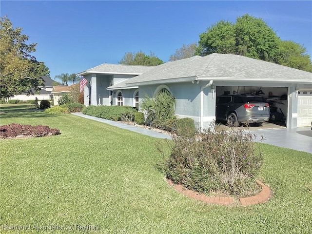 2831 Sunrise Dr, Sebring, FL 33872 - view of home's exterior with a garage, a lawn, driveway, and roof with shingles